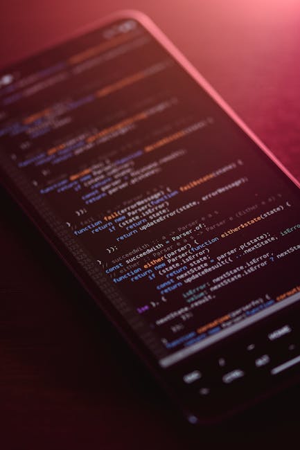 A close-up view of a computer screen displaying HTML code in a dark-themed code editor, featuring lines of code related to webpage structure with syntax highlighting in various colors such as blue, re